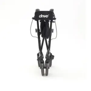 A black Drive Torro rollator is shown folded upright with its four wheels visible, photographed against a white background.