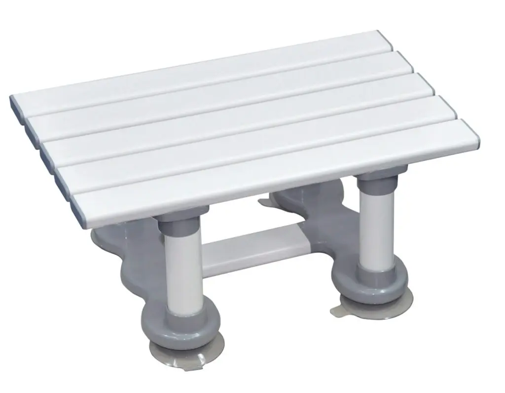 The Medina Plastic Bath Board features a white slatted seat, four short legs, and suction cup feet for stability in the shower.
