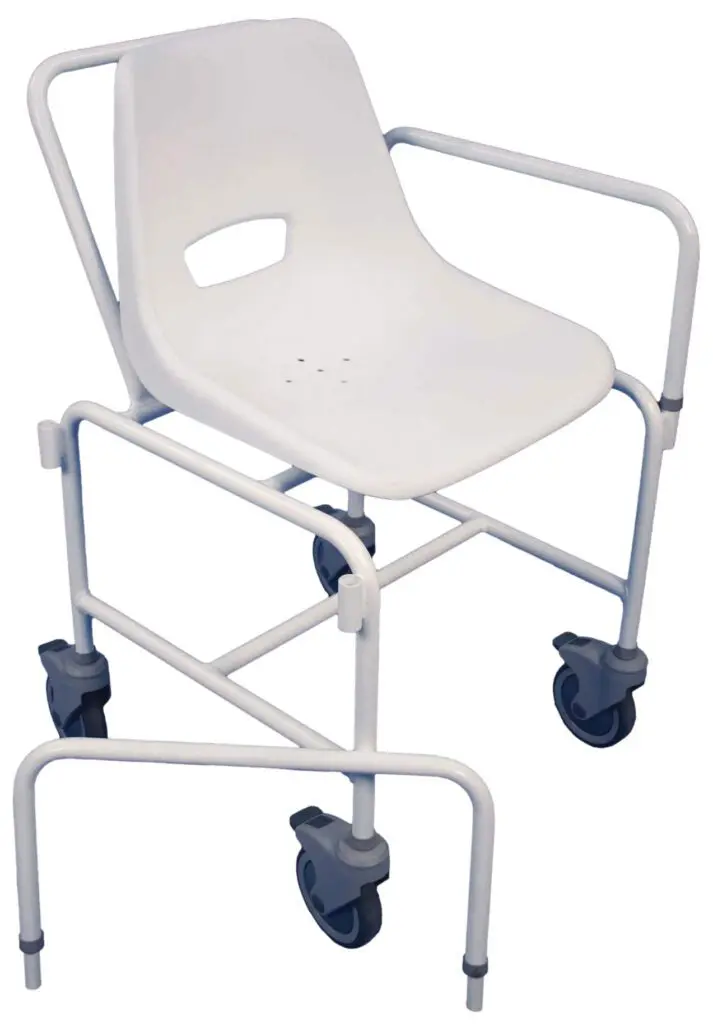 The Charing Attendant Propelled Shower Chair is a white plastic and metal chair with armrests and four wheels, designed for mobility and support during showers.
