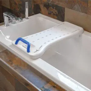 The Width Adjustable Bath Board with Integral Handle is placed across the bath to support safe entry and exit.