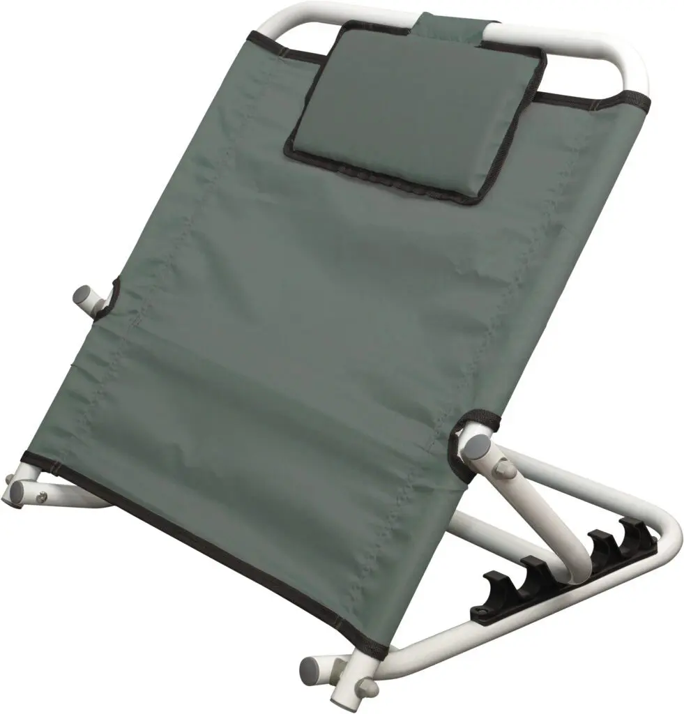 The Birling Bed Back Rest features a green fabric and white metal frame, a padded headrest, and an adjustable design for comfortable reclining support.