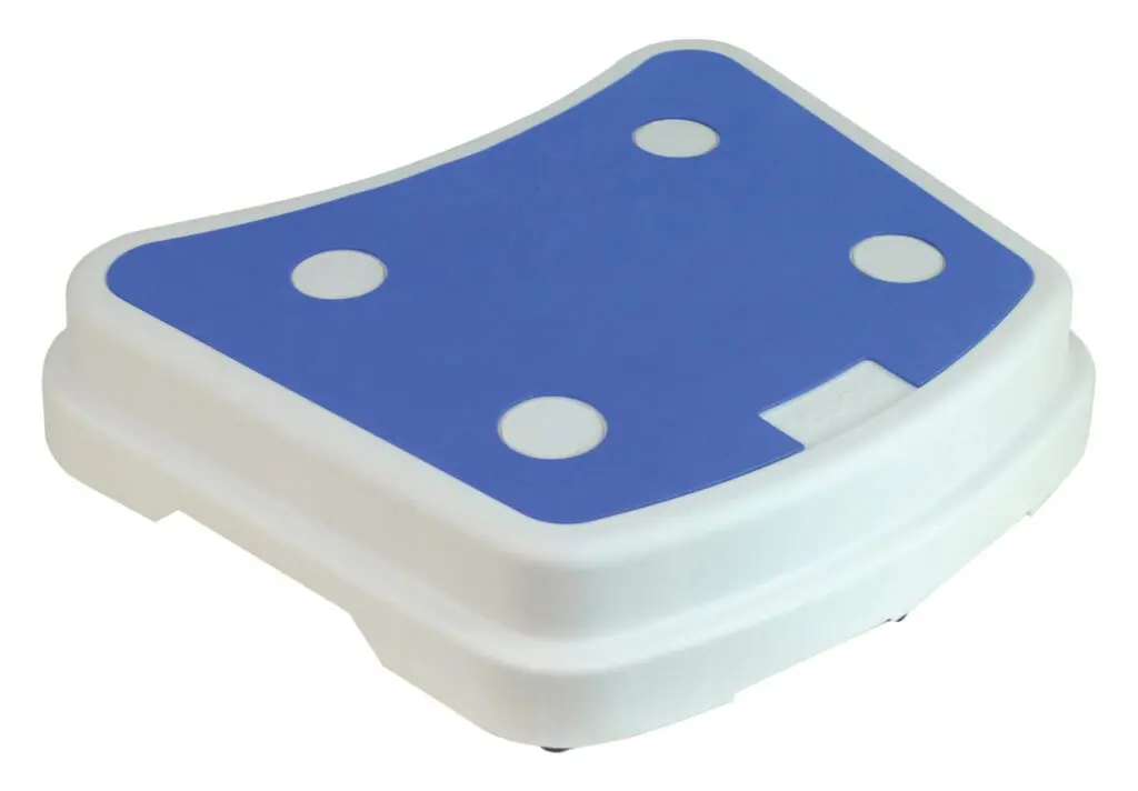 The Plastic Stackable Bath Step features a rectangular design with a blue, non-slip surface and four circular grip pads on top for added safety.