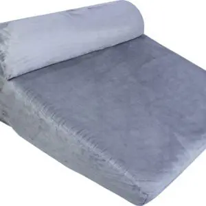 The Luxury Folding Adjustable Bed Wedge Pillow is grey, wedge-shaped with a soft fabric cover and attached bolster, designed for comfortable support and elevation.
