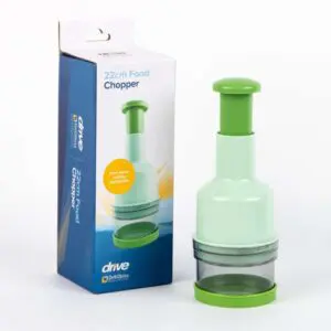 A green and white Food Chopper (22cm) stands beside its packaging, which features the product image and branding.