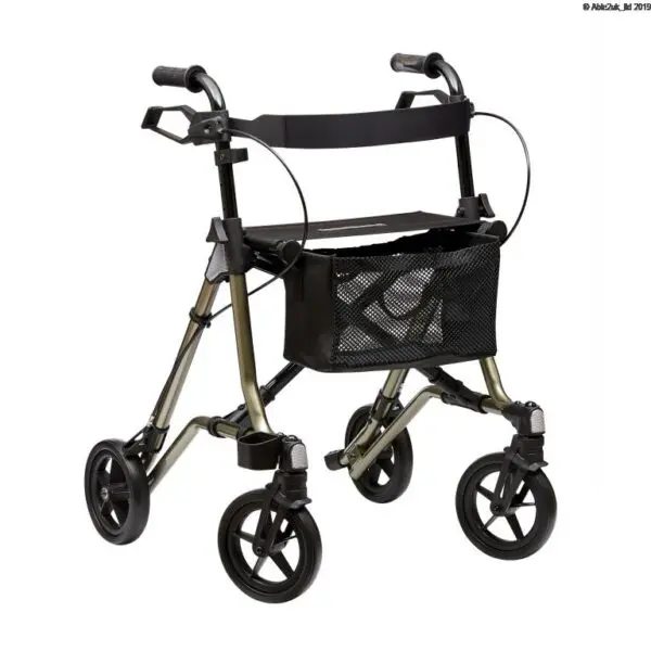 Four-wheeled rollator walker with black handles, hand brakes, a padded seat, mesh storage basket, and large black wheels on a champagne-coloured frame.