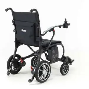 The AeroCarbon Powerchair, a black electric wheelchair with a right-armrest joystick control, is shown from the back and side against a plain white background.