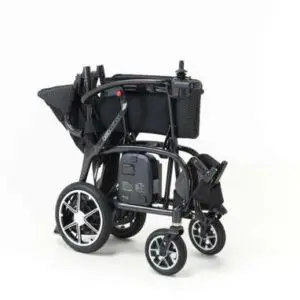 The AeroCarbon Powerchair, a black electric wheelchair with large rear wheels and smaller front wheels, is displayed folded on a white background.