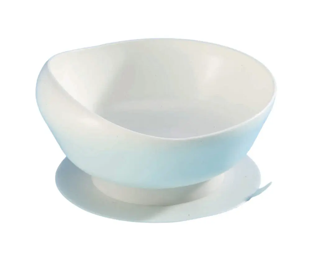 White plastic bowl with a slanted rim and a suction base, designed to stay in place on a flat surface.