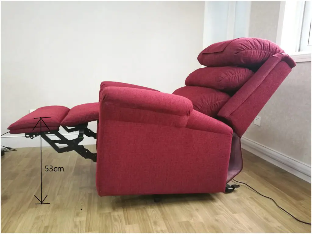 The Ecclesfield Wall Hugging Single Rise & Recliner in chenille is fully extended on wooden flooring, with an arrow showing its footrest height of 53 cm.