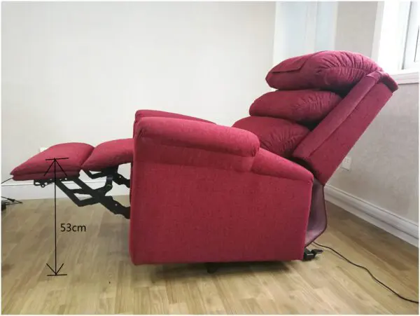 The Ecclesfield Wall Hugging Single Rise & Recliner in chenille is fully extended on wooden flooring, with an arrow showing its footrest height of 53 cm.