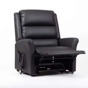 The Alaska Extra Large AM-PVC Crib 5 Dual Motor Riser Recliner in black leather, featuring an extended footrest, is displayed against a plain white background.