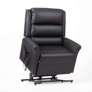 Alaska Extra Large AM-PVC Crib 5 Dual Motor Riser Recliner (Black) with padded armrests, headrest, and a side remote control pocket, displayed against a plain white background.