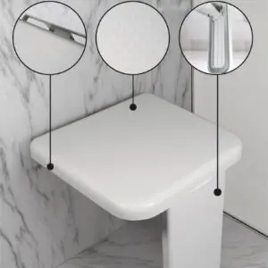 The Folding Shower Seat with Leg features a textured surface for grip and can be wall-mounted in a marble-tiled shower corner. Its foldable leg adds extra stability when in use.