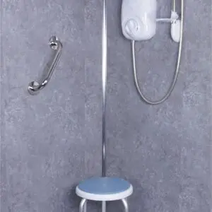 Accessible shower featuring a polished stainless steel grab rail, electric shower unit, handheld showerhead, and a small stool with a blue seat.