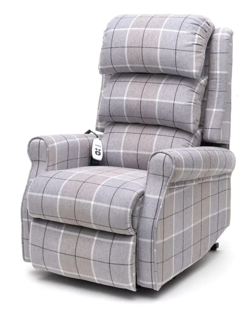 The Broadway Dual Motor Riser Recliner Chair is a grey check upholstered recliner with padded armrests and backrest, featuring a remote control attached to the side.