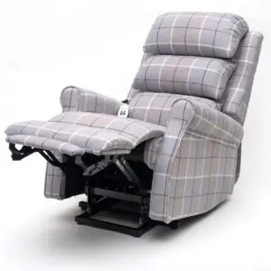 The Broadway Dual Motor Rise and Recline Chair, in grey check upholstery, features a raised footrest and is displayed against a white background.