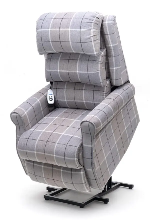 The Broadway Dual Motor Rise and Recline Chair features grey check upholstery, a remote control, and a sturdy metal base to assist users in standing up.