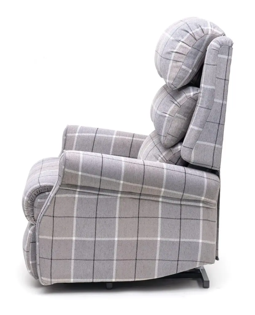 Side view of The Broadway Dual Motor Rise and Recline Chair, a grey upholstered recliner with checked pattern and padded backrest.