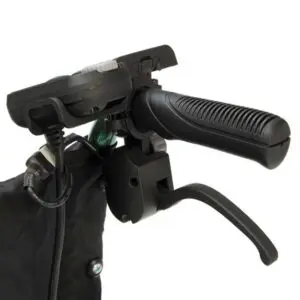 Close-up of a black handlebar with a brake lever and an attached electronic control unit, mounted on the S Drive Powerstroll mobility device.