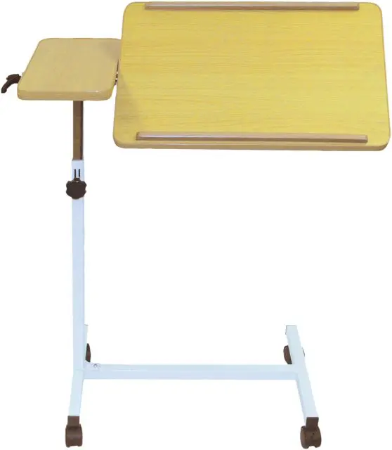 The Deluxe Multi-Purpose Overbed Wheeled Table features a large tilting wooden surface, a fixed side tray, and a sturdy metal frame with castors for easy mobility.