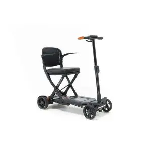 The AeroCarbon – Folding scooter, a four-wheeled electric mobility scooter featuring a black cushioned seat, backrest, and handlebars, is shown folded against a plain white background.
