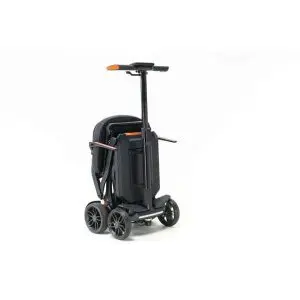 A compact, foldable electric scooter with four wheels and a tall handlebar, photographed against a plain white background.