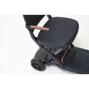 Compact mobility scooter with a black seat, armrests, and two rear wheels, shown on a white background.
