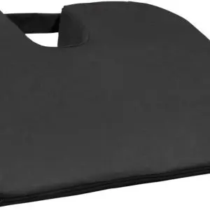 The Coccyx Wedge Cushion is a black, wedge-shaped seat cushion featuring a U-shaped cut-out and a handle at the back.