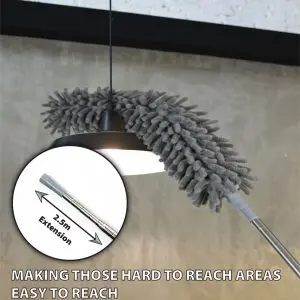 A 5 piece Professional Duster Kit With Extendable Telescopic Pole makes cleaning a hanging ceiling light easy; inset shows a telescopic pole extended to 2.5m. Text reads: "MAKING THOSE HARD TO REACH AREAS EASY TO REACH.