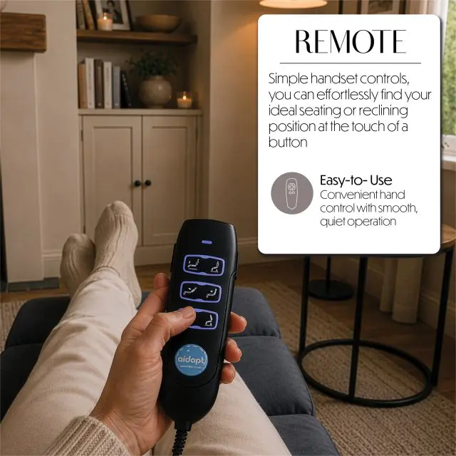 A person is holding the easy-to-use remote control with four buttons whilst relaxing in the Billingham Dual Motor Rise and Recline Chair in a living room, feet up near a bookcase and a lamp.