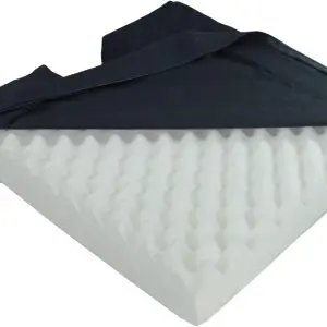 The Deluxe Pressure Relief Orthopaedic Coccyx Cushion features a wedge-shaped, egg crate foam design and a black fabric cover that's partially unzipped and pulled back.