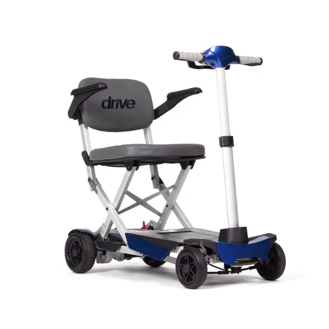 Foldable electric mobility scooter with a padded seat, armrests, four wheels, and a handlebar, shown in an unfolded position.