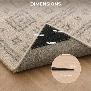 A triangular Rug Stops (Pack of 8) gripper placed under a rug corner, with labels showing dimensions of 75mm on each side and a thickness of 2.8mm.