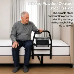 An elderly man sits on the edge of a bed, resting his hand on a black Solo Bed Transfer Aid with an attached storage pouch; text highlights its steel frame and 120kg weight capacity.