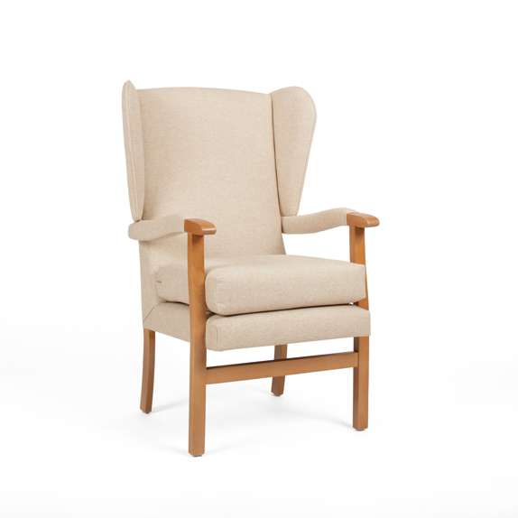 A beige upholstered wingback armchair with wooden legs and armrests, set against a plain white background.