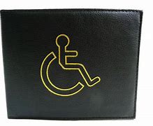 A black leather bifold wallet featuring a yellow wheelchair accessibility symbol embroidered on the front.