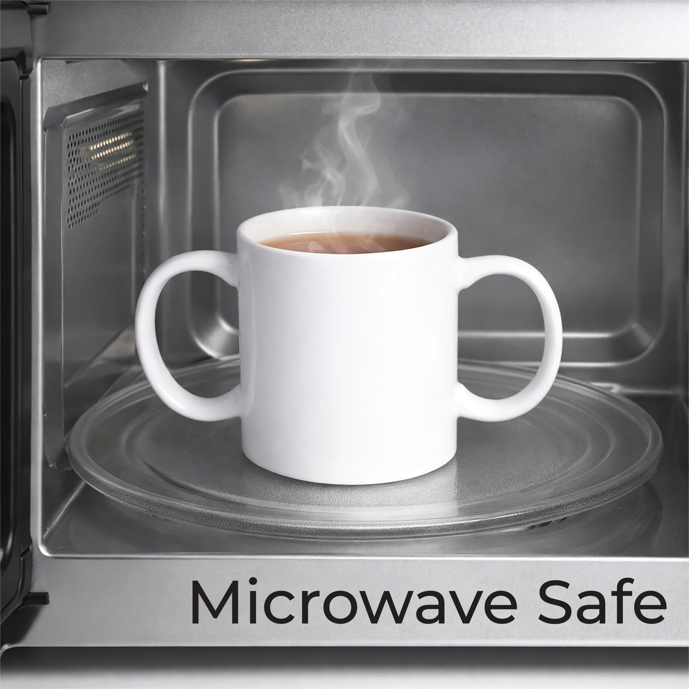 A white mug with two handles sits on a glass turntable inside a microwave, with steam rising. The words "Microwave Safe" are written at the bottom.