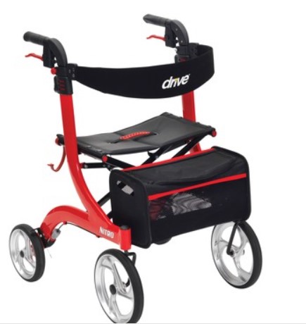 Red four-wheeled rollator with a seat, black mesh storage bag, hand brakes, and back support, branded “Drive”.