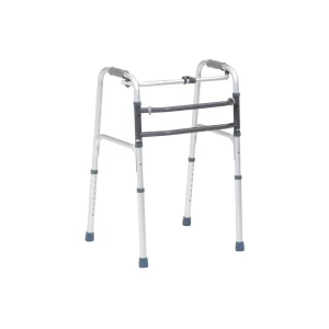 The Walking Zimmer frame, a metal folding mobility aid with grey rubber hand grips and feet, is displayed against a plain white background.