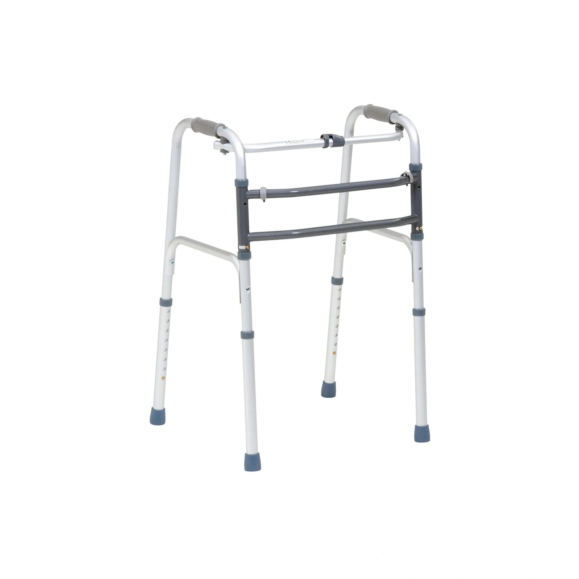 The Walking Zimmer frame, a metal folding mobility aid with grey rubber hand grips and feet, is displayed against a plain white background.